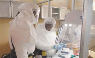 Laboratory technicians in the United States Army
Medical Research Institute of Infectious Diseases
(USAMRIID) conduct Ebola research.
