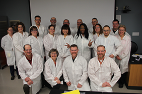 New restaurant inspectors and instructors from
Iowa Department of Inspection and Appeals, and
Environmental Microbiology staff pose during a break
from a course that teaches food microbiology concepts,
procedures and techniques.