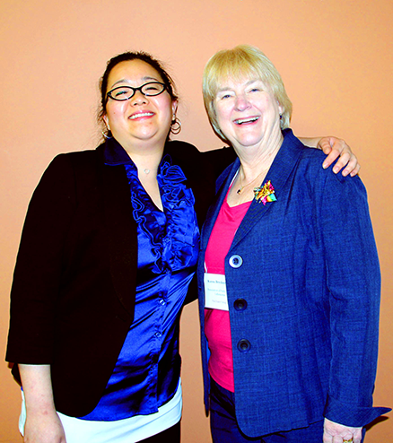 APHLs Karen Breckenridge (right) and Tina Su pose during the Laboratory System Improvement Program meeting, which they helped lead at the Hygienic Laboratory in April.