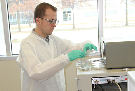 Dustin May works in the State Hygienic Laboratory Radiochemistry lab.